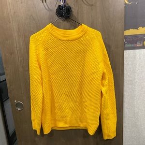 yellow sweater